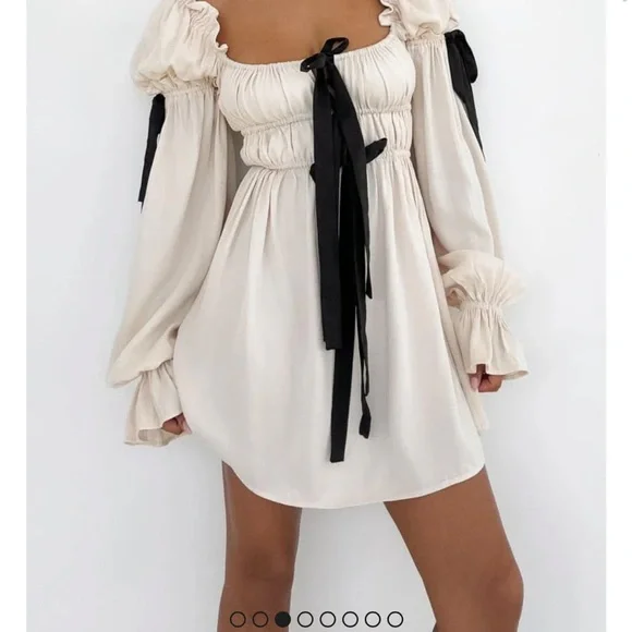 white christmas dresses Elodie Floral Babydoll Dress in Cream main image 1